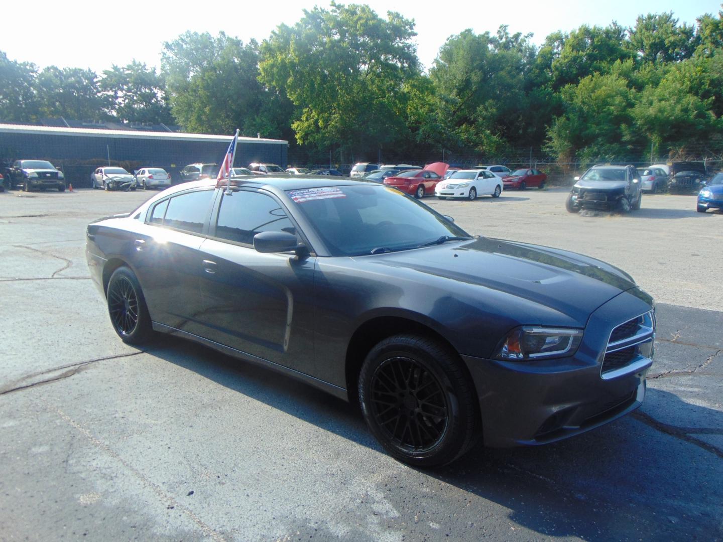 2014 Gray Dodge Charger (2C3CDXHG1EH) , located at 2105 Dixie Hwy, Louisville, KY, 40210, (502) 772-3333, 38.220932, -85.795441 - We're Kentuckiana's Number 1 Buy Here Pay Here and 2nd chance finance dealership! Conveniently located in central Louisville, Kentucky and right across the Ohio river from Southern Indiana we strive to provide clean dependable used cars, trucks, vans and SUV’s with affordable down payments and pay - Photo#16