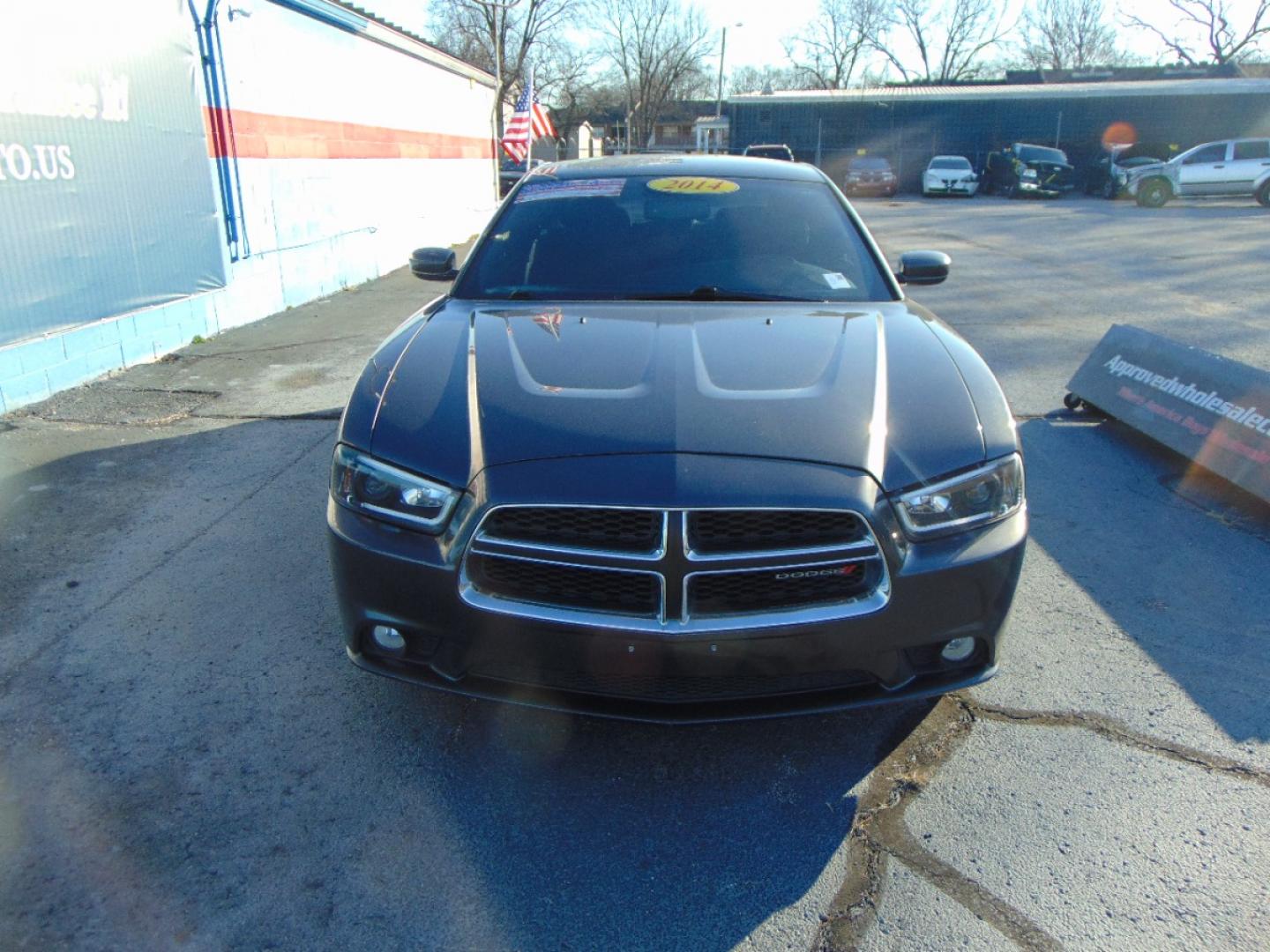 2014 Gray Dodge Charger (2C3CDXHG1EH) , located at 2105 Dixie Hwy, Louisville, KY, 40210, (502) 772-3333, 38.220932, -85.795441 - We're Kentuckiana's Number 1 Buy Here Pay Here and 2nd chance finance dealership! Conveniently located in central Louisville, Kentucky and right across the Ohio river from Southern Indiana we strive to provide clean dependable used cars, trucks, vans and SUV’s with affordable down payments and pay - Photo#2