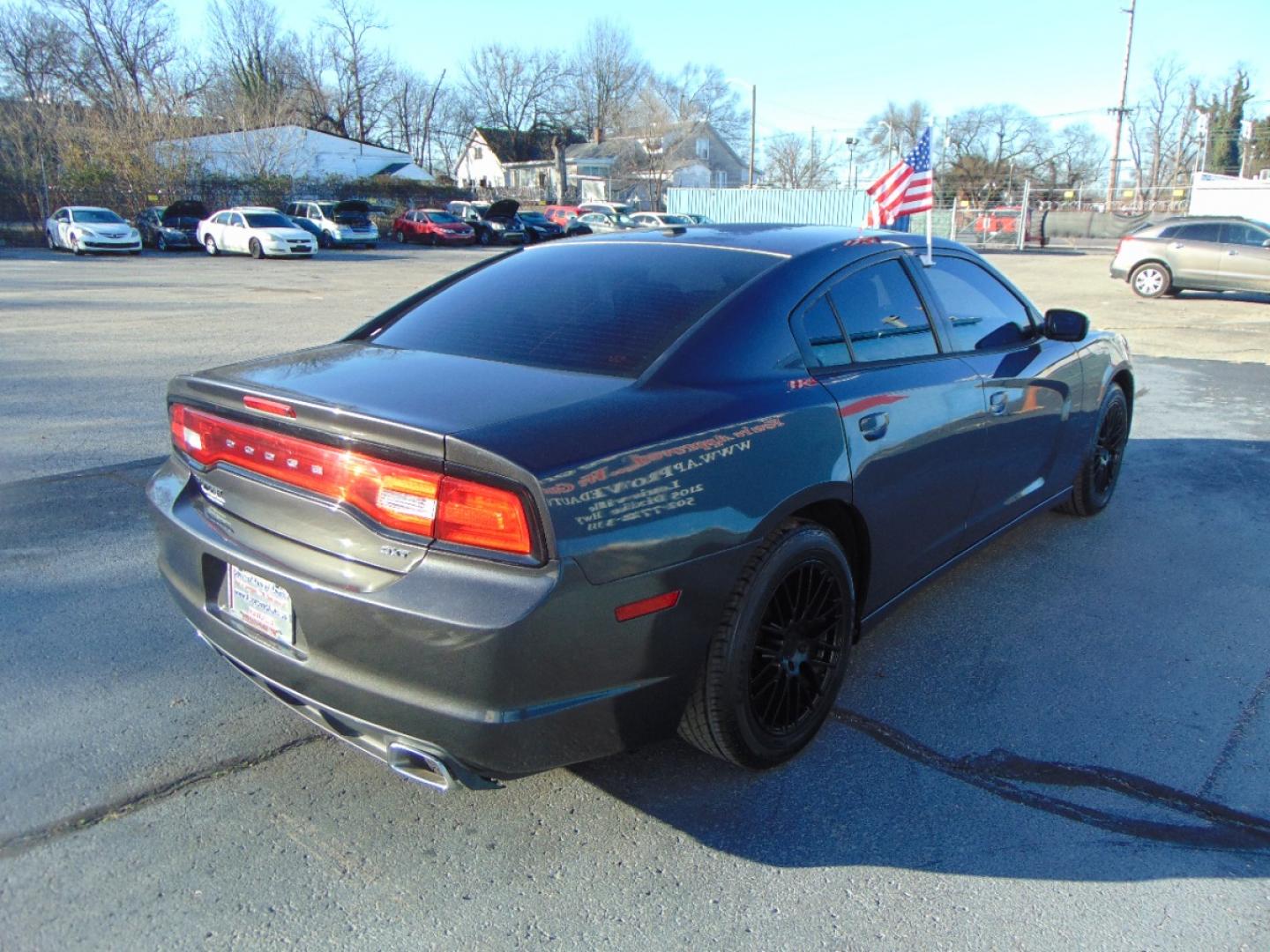 2014 Gray Dodge Charger (2C3CDXHG1EH) , located at 2105 Dixie Hwy, Louisville, KY, 40210, (502) 772-3333, 38.220932, -85.795441 - We're Kentuckiana's Number 1 Buy Here Pay Here and 2nd chance finance dealership! Conveniently located in central Louisville, Kentucky and right across the Ohio river from Southern Indiana we strive to provide clean dependable used cars, trucks, vans and SUV’s with affordable down payments and pay - Photo#6