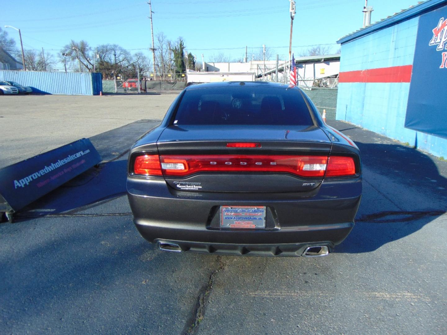 2014 Gray Dodge Charger (2C3CDXHG1EH) , located at 2105 Dixie Hwy, Louisville, KY, 40210, (502) 772-3333, 38.220932, -85.795441 - We're Kentuckiana's Number 1 Buy Here Pay Here and 2nd chance finance dealership! Conveniently located in central Louisville, Kentucky and right across the Ohio river from Southern Indiana we strive to provide clean dependable used cars, trucks, vans and SUV’s with affordable down payments and pay - Photo#7