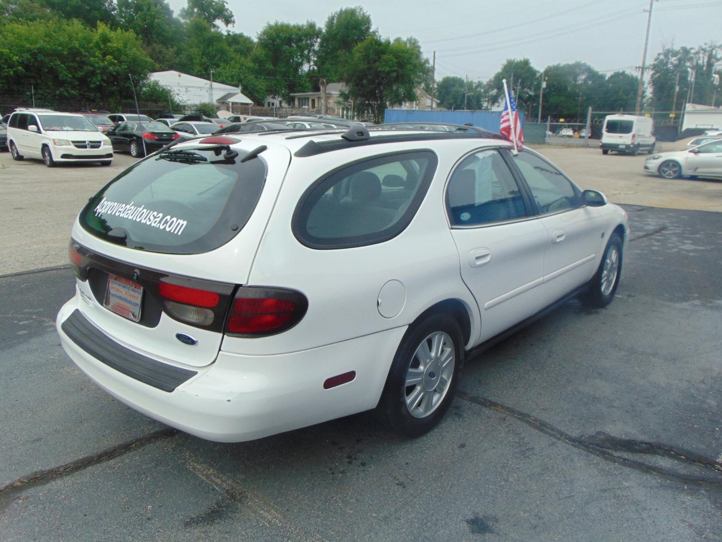 2004 White Ford Taurus (1FAHP59S94A) with an V6 24V 3.0 Liter engine, Automatic transmission, located at 2105 Dixie Hwy, Louisville, KY, 40210, (502) 772-3333, 38.220932, -85.795441 - Unable to interpret response, please check raw response - Photo#14