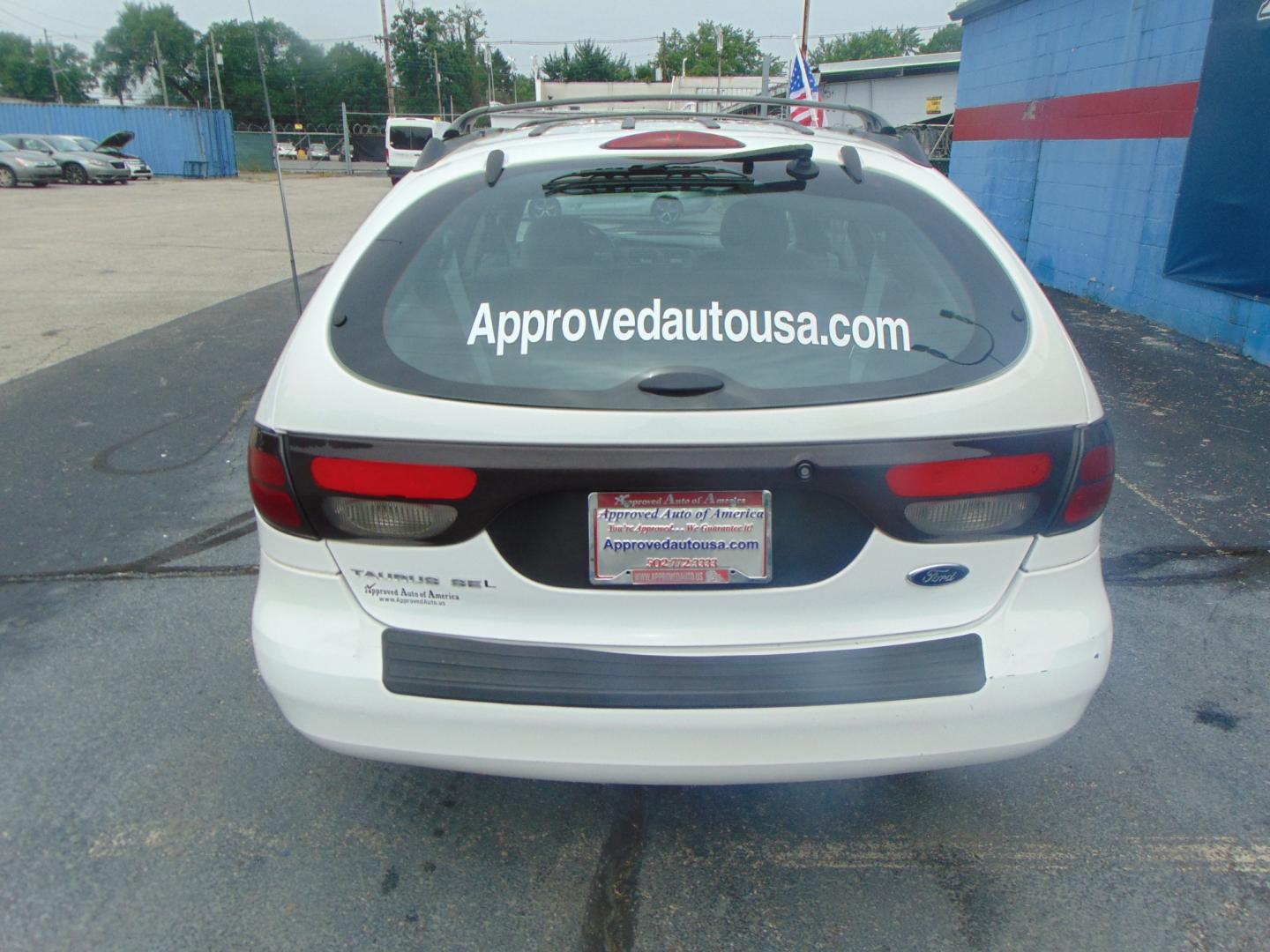 2004 White Ford Taurus (1FAHP59S94A) with an V6 24V 3.0 Liter engine, Automatic transmission, located at 2105 Dixie Hwy, Louisville, KY, 40210, (502) 772-3333, 38.220932, -85.795441 - Unable to interpret response, please check raw response - Photo#15