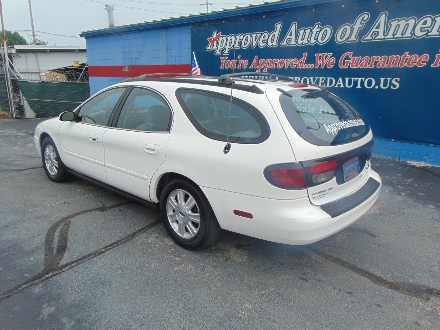 2004 White Ford Taurus (1FAHP59S94A) with an V6 24V 3.0 Liter engine, Automatic transmission, located at 2105 Dixie Hwy, Louisville, KY, 40210, (502) 772-3333, 38.220932, -85.795441 - Unable to interpret response, please check raw response - Photo#16