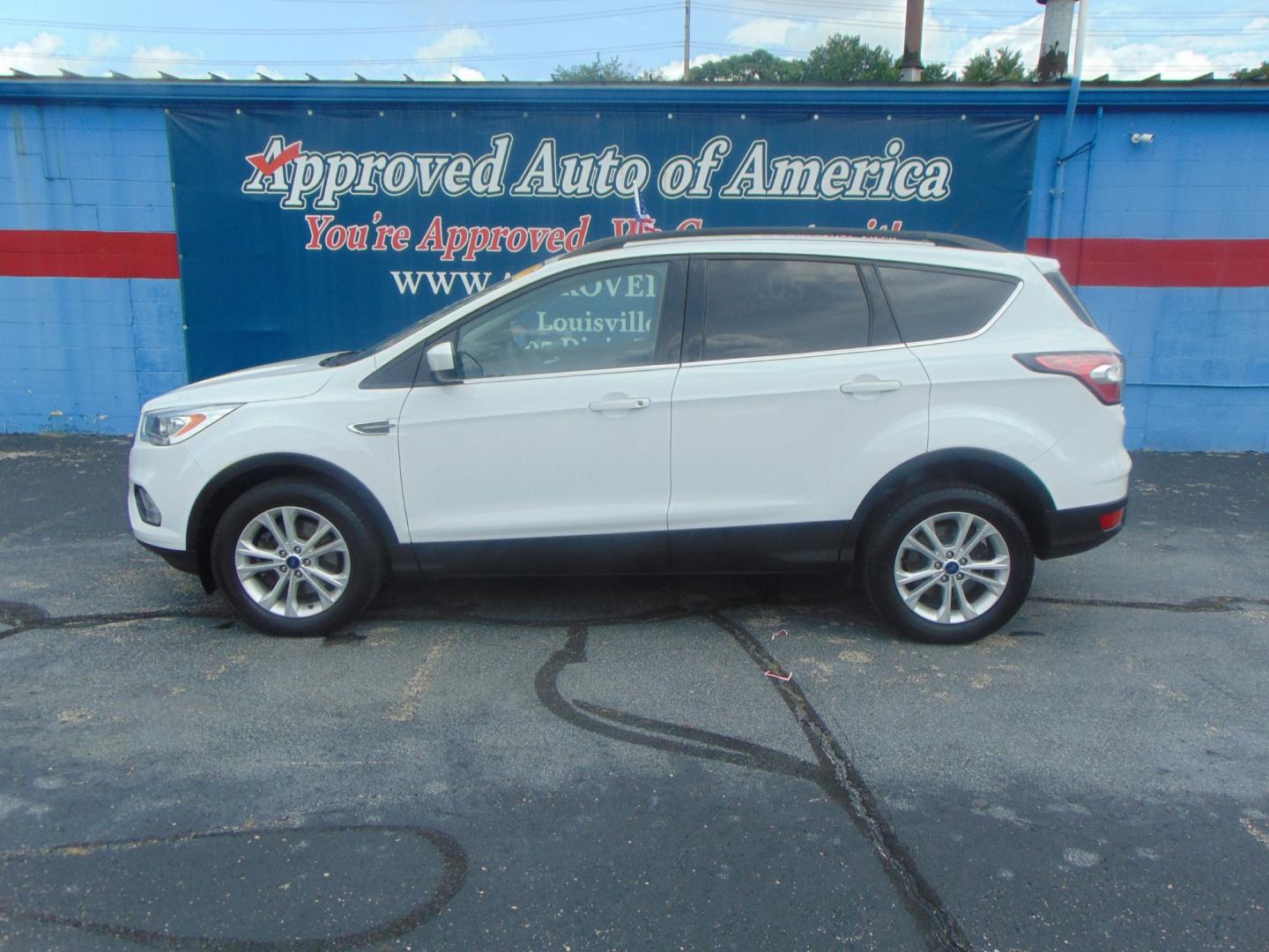 2017 White Ford Escape (1FMCU9GD4HU) with an 4-Cyl EcoBoost 1.5T engine, Auto, 6-Spd w/SelShft transmission, located at 2105 Dixie Hwy, Louisville, KY, 40210, (502) 772-3333, 38.220932, -85.795441 - We're Kentuckiana's Number 1 Buy Here Pay Here and 2nd chance finance dealership! Conveniently located in central Louisville, Kentucky and right across the Ohio river from Southern Indiana we strive to provide clean dependable used cars, trucks, vans and SUV’s with affordable down payments and pay - Photo#0