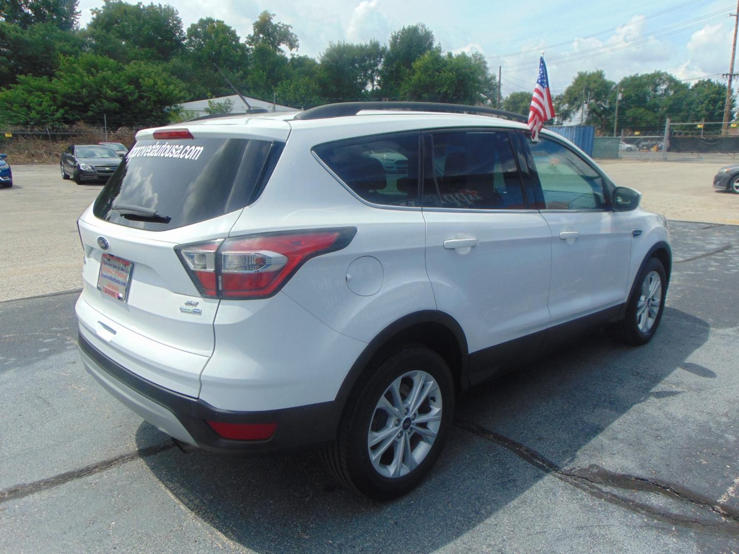 2017 White Ford Escape (1FMCU9GD4HU) with an 4-Cyl EcoBoost 1.5T engine, Auto, 6-Spd w/SelShft transmission, located at 2105 Dixie Hwy, Louisville, KY, 40210, (502) 772-3333, 38.220932, -85.795441 - We're Kentuckiana's Number 1 Buy Here Pay Here and 2nd chance finance dealership! Conveniently located in central Louisville, Kentucky and right across the Ohio river from Southern Indiana we strive to provide clean dependable used cars, trucks, vans and SUV’s with affordable down payments and pay - Photo#19