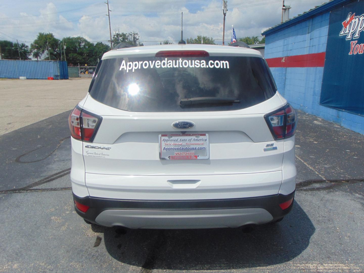 2017 White Ford Escape (1FMCU9GD4HU) with an 4-Cyl EcoBoost 1.5T engine, Auto, 6-Spd w/SelShft transmission, located at 2105 Dixie Hwy, Louisville, KY, 40210, (502) 772-3333, 38.220932, -85.795441 - We're Kentuckiana's Number 1 Buy Here Pay Here and 2nd chance finance dealership! Conveniently located in central Louisville, Kentucky and right across the Ohio river from Southern Indiana we strive to provide clean dependable used cars, trucks, vans and SUV’s with affordable down payments and pay - Photo#21