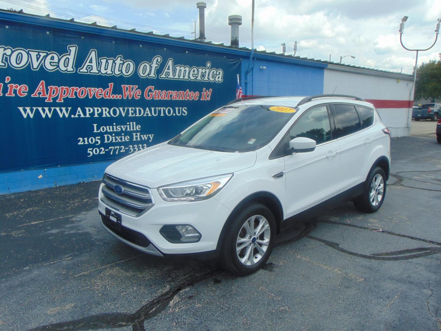 2017 White Ford Escape (1FMCU9GD4HU) with an 4-Cyl EcoBoost 1.5T engine, Auto, 6-Spd w/SelShft transmission, located at 2105 Dixie Hwy, Louisville, KY, 40210, (502) 772-3333, 38.220932, -85.795441 - We're Kentuckiana's Number 1 Buy Here Pay Here and 2nd chance finance dealership! Conveniently located in central Louisville, Kentucky and right across the Ohio river from Southern Indiana we strive to provide clean dependable used cars, trucks, vans and SUV’s with affordable down payments and pay - Photo#3