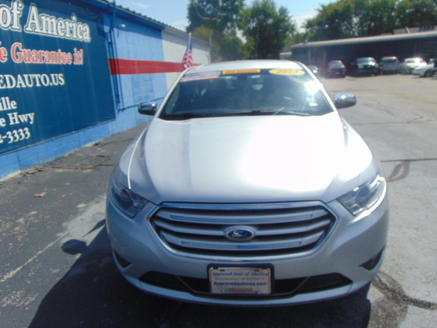 2013 Silver Ford Taurus (1FAHP2F8XDG) with an V6 3.5 Liter engine, Auto, 6-Spd w/SelShft transmission, located at 2105 Dixie Hwy, Louisville, KY, 40210, (502) 772-3333, 38.220932, -85.795441 - We're Kentuckiana's Number 1 Buy Here Pay Here and 2nd chance finance dealership! Conveniently located in central Louisville, Kentucky and right across the Ohio river from Southern Indiana we strive to provide clean dependable used cars, trucks, vans and SUV’s with affordable down payments and pay - Photo#5