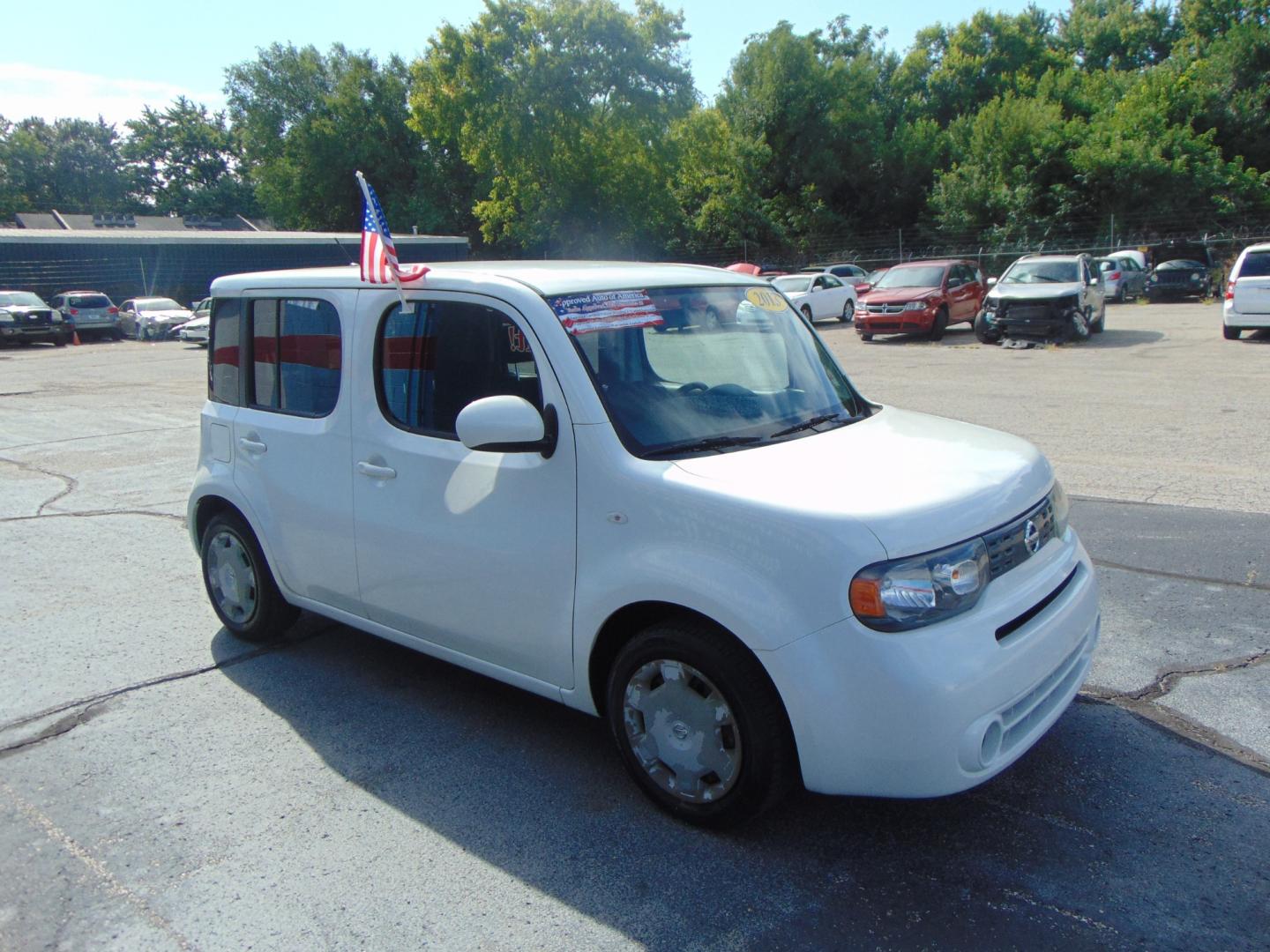 2013 White Nissan cube (JN8AZ2KRXDT) with an 4-Cyl 1.8 Liter engine, Automatic, CVT transmission, located at 2105 Dixie Hwy, Louisville, KY, 40210, (502) 772-3333, 38.220932, -85.795441 - We're Kentuckiana's Number 1 Buy Here Pay Here and 2nd chance finance dealership! Conveniently located in central Louisville, Kentucky and right across the Ohio river from Southern Indiana we strive to provide clean dependable used cars, trucks, vans and SUV’s with affordable down payments and pay - Photo#5