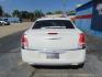 2014 White Chrysler 300 (2C3CCAAG7EH) with an V6 Flex Fuel 3.6 Liter engine, Automatic, 8-Spd transmission, located at 2105 Dixie Hwy, Louisville, KY, 40210, (502) 772-3333, 38.220932, -85.795441 - Photo#4