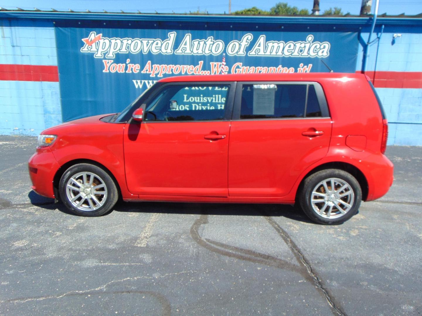 2009 Red Scion xB (JTLKE50E691) with an 4-Cyl 2.4 Liter engine, Automatic, 4-Spd w/Overdrive transmission, located at 2105 Dixie Hwy, Louisville, KY, 40210, (502) 772-3333, 38.220932, -85.795441 - Photo#0