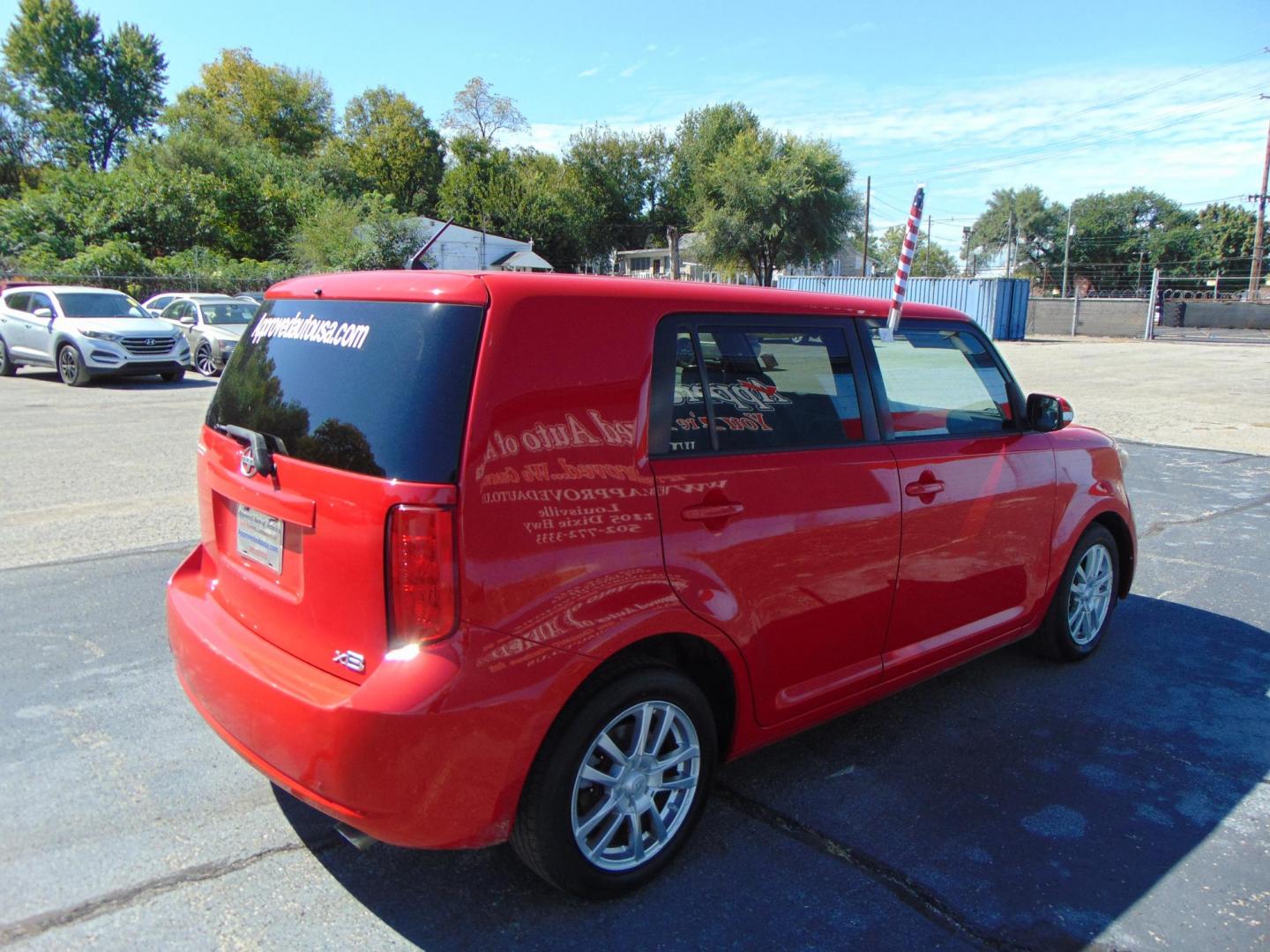 2009 Red Scion xB (JTLKE50E691) with an 4-Cyl 2.4 Liter engine, Automatic, 4-Spd w/Overdrive transmission, located at 2105 Dixie Hwy, Louisville, KY, 40210, (502) 772-3333, 38.220932, -85.795441 - Photo#4