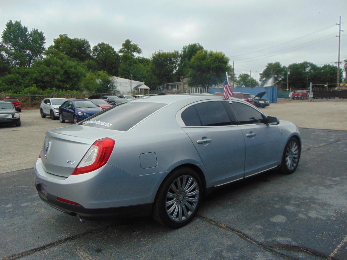 2013 Lincoln MKS FWD (1LNHL9DK8DG) with an 3.5L V6 DOHC 24V engine, 6-Speed Automatic transmission, located at 2105 Dixie Hwy, Louisville, KY, 40210, (502) 772-3333, 38.220932, -85.795441 - Photo#4