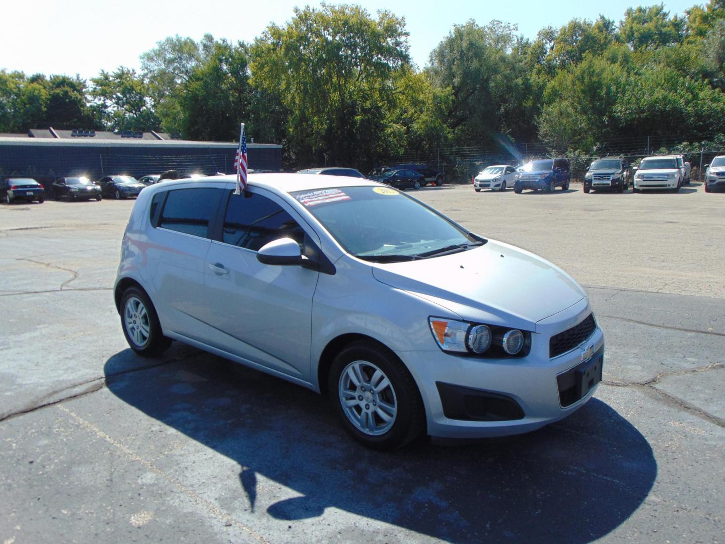 2012 Chevrolet Sonic 2LT 5-Door (1G1JC6SH7C4) with an 1.8L L4 DOHC 24V FFV engine, 6-Speed Automatic transmission, located at 2105 Dixie Hwy, Louisville, KY, 40210, (502) 772-3333, 38.220932, -85.795441 - Photo#2