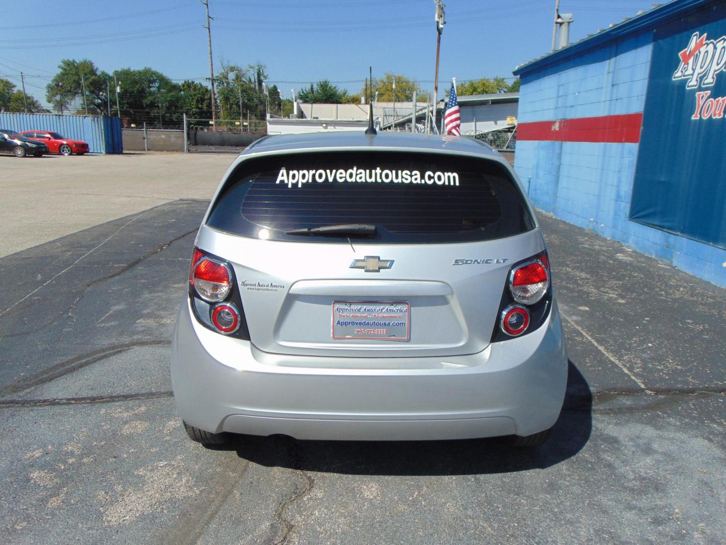 2012 Chevrolet Sonic 2LT 5-Door (1G1JC6SH7C4) with an 1.8L L4 DOHC 24V FFV engine, 6-Speed Automatic transmission, located at 2105 Dixie Hwy, Louisville, KY, 40210, (502) 772-3333, 38.220932, -85.795441 - Photo#4